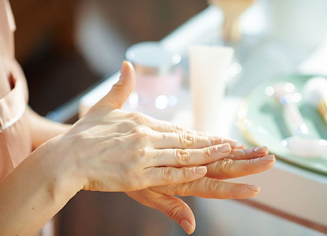 photo of dry skin on hands of a woman